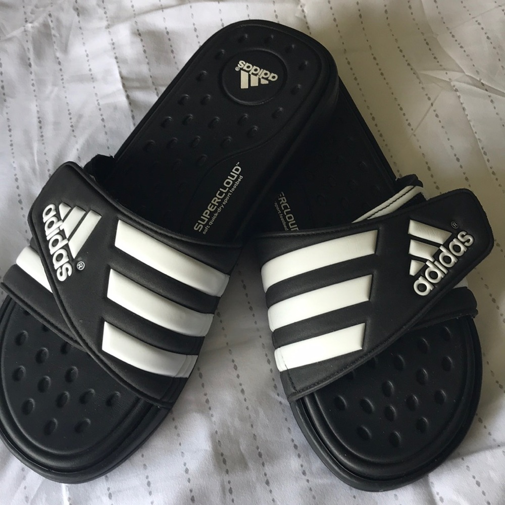 Men’s adidas slides size 10. Never worn.